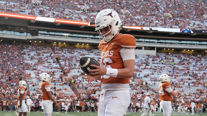 Texas Longhorns quarterback Arch Manning (16) warms up before the game against the Mississippi Rebels at Darrell K Royal-Texas Memorial Stadium. Texas Longhorns quarterback Arch Manning (16) warms up before the game against the Mississippi Rebels at Darrell K Royal-Texas Memorial Stadium.
