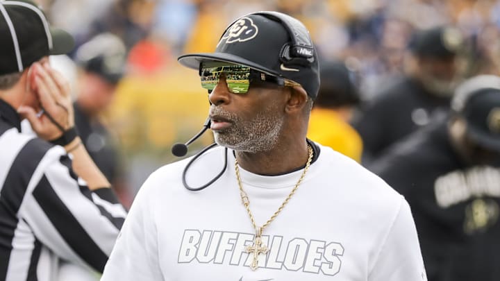 Nov 8, 2025; Morgantown, West Virginia, USA; Colorado Buffaloes head coach Deion Sanders walks along the sidelines late in the fourth quarter against the West Virginia Mountaineers at Milan Puskar Stadium. 