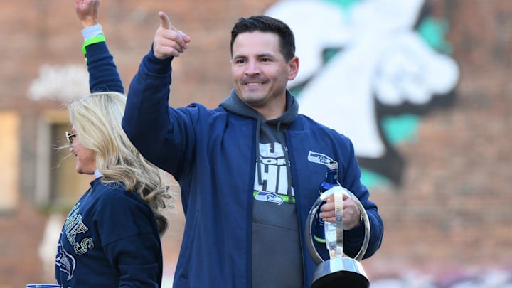 Feb 11, 2026; Seattle, WA, USA; Seattle Seahawks head coach Mike MacDonald interacts with fans during the Super Bowl LX World Champions parade in downtown Seattle. Mandatory Credit: Steven Bisig-Imagn Images