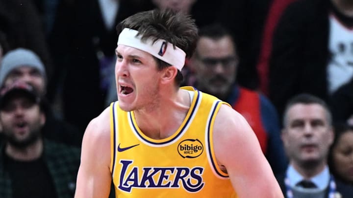 Dec 4, 2025; Toronto, Ontario, CAN; Los Angeles Lakers guard Austin Reaves (15) reacts after scoring a basket against the Toronto Raptors in the second half at Scotiabank Arena. Mandatory Credit: Dan Hamilton-Imagn Images