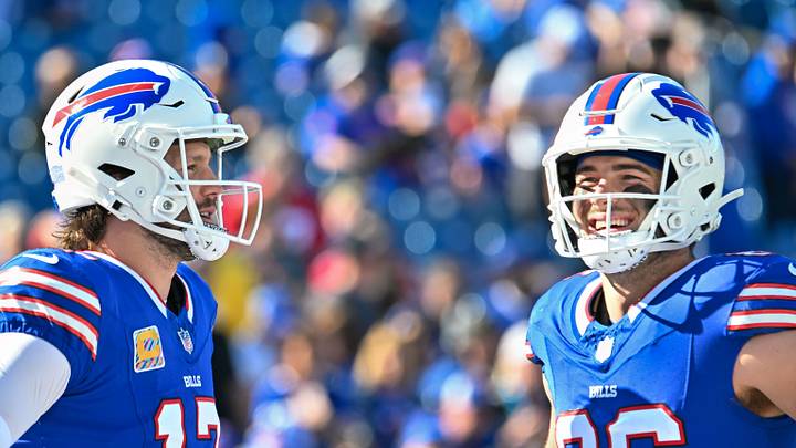 Oct 20, 2024; Orchard Park, New York, USA; Buffalo Bills quarterback Josh Allen (17) and tight end Dalton Kincaid (86) have a word before a game against the Tennessee Titans at Highmark Stadium. Mandatory Credit: Mark Konezny-Imagn Images