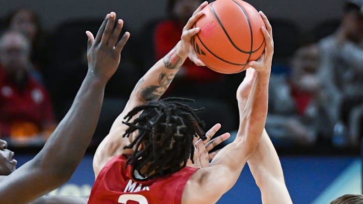 Indiana Hoosiers forward Payton Sparks (24) and Indiana Hoosiers guard Gabe Cupps (2) defend Harvard Crimson guard Malik Mack (2) during the game against Harvard in Gainbridge Fieldhouse in Indianapolis, Ind. on Sunday, Nob. 26, 2023. Indiana Hoosiers forward Payton Sparks (24) and Indiana Hoosiers guard Gabe Cupps (2) defend Harvard Crimson guard Malik Mack (2) during the game against Harvard in Gainbridge Fieldhouse in Indianapolis, Ind. on Sunday, Nob. 26, 2023.