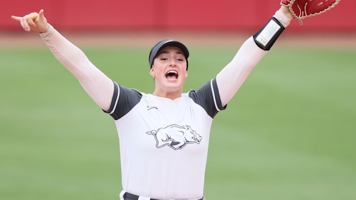 May 25, 2025; Fayetteville, AR, USA; Arkansas Razorbacks first baseman Bri Ellis (77) prior to facing the Ole Miss Rebels in game three of the Fayetteville Super Regional at Bogle Park. Mandatory Credit: Nelson Chenault-Imagn Images