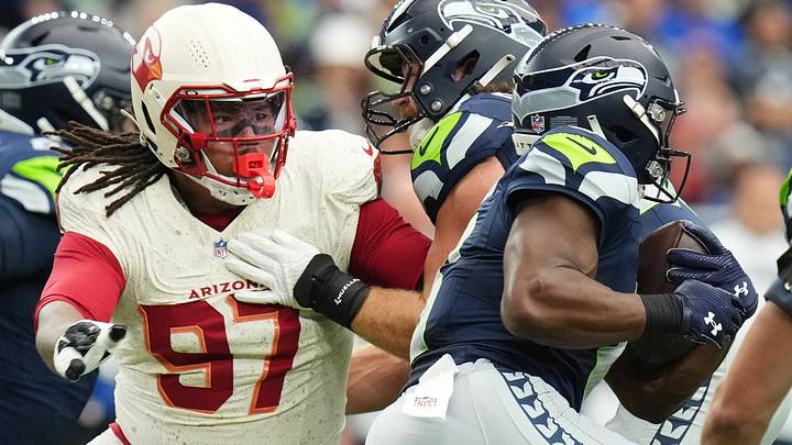 Arizona Cardinals defensive lineman Walter Nolen III (97) closes in on Seattle Seahawks running back Jadarian Price (8) at State Farm Stadium in Glendale on Sept. 20, 2026. Arizona Cardinals defensive lineman Walter Nolen III (97) closes in on Seattle Seahawks running back Jadarian Price (8) at State Farm Stadium in Glendale on Sept. 20, 2026.