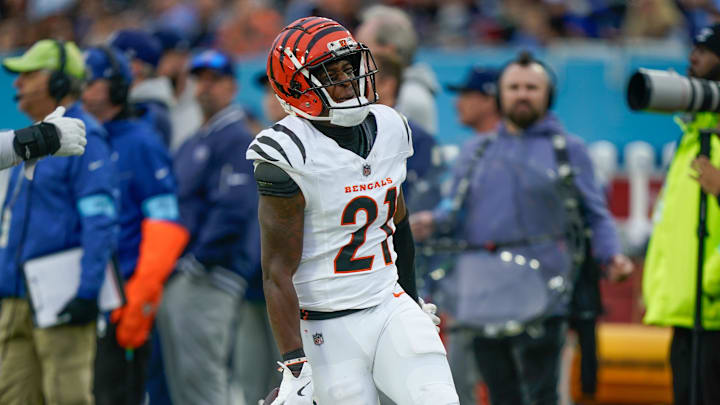 Cincinnati Bengals cornerback Mike Hilton (21) celebrates his interception of a pass by Tennessee Titans quarterback Will Levis (8) during the second quarter at Nissan Stadium in Nashville, Tenn., Sunday, Dec. 15, 2024.