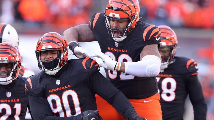 Dec 22, 2024; Cincinnati, Ohio, USA; Cincinnati Bengals defensive tackle B.J. Hill (92) celebrates a sack with defensive tackle Kris Jenkins Jr. (90) during the first quarter against the Cleveland Browns at Paycor Stadium. Mandatory Credit: Joseph Maiorana-Imagn Images Dec 22, 2024; Cincinnati, Ohio, USA; Cincinnati Bengals defensive tackle B.J. Hill (92) celebrates a sack with defensive tackle Kris Jenkins Jr. (90) during the first quarter against the Cleveland Browns at Paycor Stadium. Mandatory Credit: Joseph Maiorana-Imagn Images