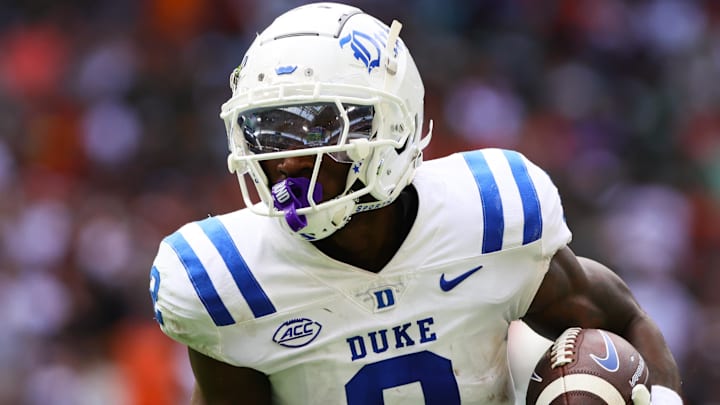 Nov 2, 2024; Miami Gardens, Florida, USA; Duke Blue Devils wide receiver Sahmir Hagans (2) runs with the football for a touchdown against the Miami Hurricanes during the second quarter at Hard Rock Stadium. Mandatory Credit: Sam Navarro-Imagn Images