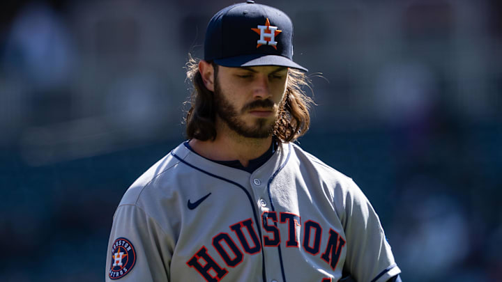 Houston Astros starting pitcher Spencer Arrighetti (41) walks to the dugout after being relieved during the fourth inning against the Minnesota Twins at Target Field.