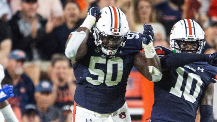 Auburn Tigers defensive lineman Marcus Harris (50) celebrates after making a goal line stand as Auburn Tigers take on San Jose State Spartans at Jordan-Hare Stadium in Auburn, Ala., on Saturday, Sept. 10, 2022. San Jose State Spartans lead Auburn Tigers 10-7 at halftime. Auburn Tigers defensive lineman Marcus Harris (50) celebrates after making a goal line stand as Auburn Tigers take on San Jose State Spartans at Jordan-Hare Stadium in Auburn, Ala., on Saturday, Sept. 10, 2022. San Jose State Spartans lead Auburn Tigers 10-7 at halftime.