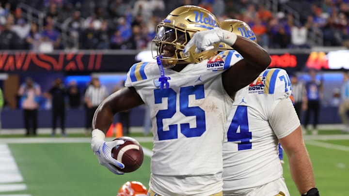Dec 16, 2023; Inglewood, CA, USA; UCLA Bruins running back TJ Harden (25) reacts after scoring a touchdown against Boise State Broncos during the third quarter of the LA Bowl at SoFi Stadium. Mandatory Credit: Kiyoshi Mio-Imagn Images Dec 16, 2023; Inglewood, CA, USA; UCLA Bruins running back TJ Harden (25) reacts after scoring a touchdown against Boise State Broncos during the third quarter of the LA Bowl at SoFi Stadium. Mandatory Credit: Kiyoshi Mio-Imagn Images