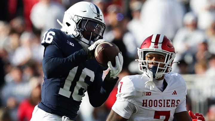 Nov 8, 2025; University Park, Pennsylvania, USA; Penn State Nittany Lions safety King Mack (16) intercepts the ball during the fourth quarter against the Indiana Hoosiers at Beaver Stadium. Mandatory Credit: Matthew O'Haren-Imagn Images