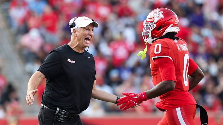 Nov 22, 2025; Houston, Texas, USA; Houston Cougars head coach Willie Fritz celebrates with wide receiver Amare Thomas (0) after Thomas scores a touchdown during the second quarter against the TCU Horned Frogs at TDECU Stadium. Mandatory Credit: Troy Taormina-Imagn Images Nov 22, 2025; Houston, Texas, USA; Houston Cougars head coach Willie Fritz celebrates with wide receiver Amare Thomas (0) after Thomas scores a touchdown during the second quarter against the TCU Horned Frogs at TDECU Stadium. Mandatory Credit: Troy Taormina-Imagn Images