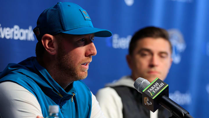 Jacksonville Jaguars head coach Liam Coen speaks during a press conference as general manager James Gladstone looks on at the Miller Electric Center, Wednesday, Jan. 14, 2026, in Jacksonville, Fla.