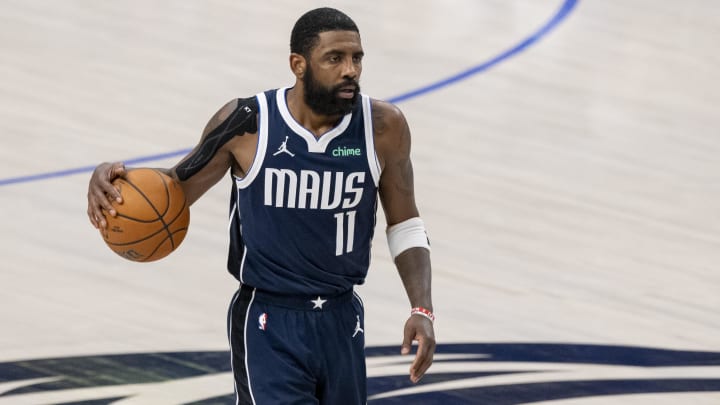 Mavericks guard Kyrie Irving dribbles the ball during Game 4 of the 2024 NBA Finals at American Airlines Center. Mavericks guard Kyrie Irving dribbles the ball during Game 4 of the 2024 NBA Finals at American Airlines Center.