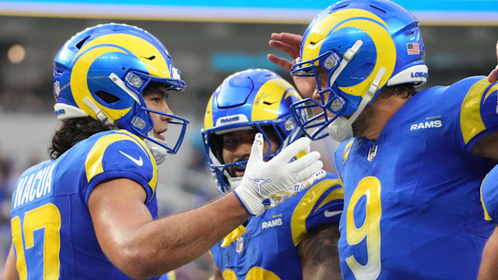 Dec 8, 2024; Inglewood, California, USA; Los Angeles Rams wide receiver Puka Nacua (17) celebrates with quarterback Matthew Stafford (9) and running back Kyren Williams (23) after scoring on a 4-yard touchdown run in the second quarter against the Buffalo Bills at SoFi Stadium. Mandatory Credit: Kirby Lee-Imagn Images