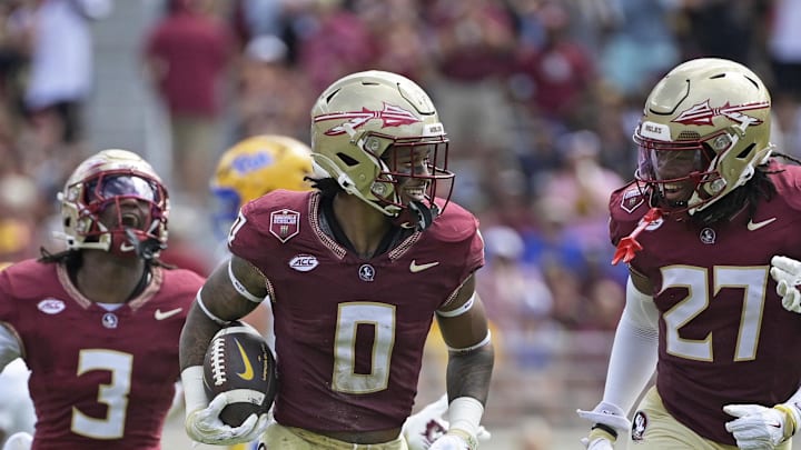 Oct 11, 2025; Tallahassee, Florida, USA; Florida State Seminoles safety Earl Little Jr. (0), defensive back Ashlynd Barker (27), defensive back Edwin Joseph (3), and defensive back Ja'Bril Rawls (11) celebrate after an interception during the first half of the game against the Pittsburgh Panthers at Doak S. Campbell Stadium. Mandatory Credit: Melina Myers-Imagn Images Oct 11, 2025; Tallahassee, Florida, USA; Florida State Seminoles safety Earl Little Jr. (0), defensive back Ashlynd Barker (27), defensive back Edwin Joseph (3), and defensive back Ja'Bril Rawls (11) celebrate after an interception during the first half of the game against the Pittsburgh Panthers at Doak S. Campbell Stadium. Mandatory Credit: Melina Myers-Imagn Images