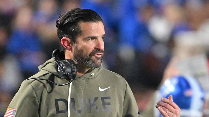 Nov 15, 2025; Durham, North Carolina, USA; Duke Blue Devils head coach Manny Diaz reacts during the third quarter against the Virginia Cavaliers at Wallace Wade Stadium. Mandatory Credit: Zachary Taft-Imagn Images Nov 15, 2025; Durham, North Carolina, USA; Duke Blue Devils head coach Manny Diaz reacts during the third quarter against the Virginia Cavaliers at Wallace Wade Stadium. Mandatory Credit: Zachary Taft-Imagn Images