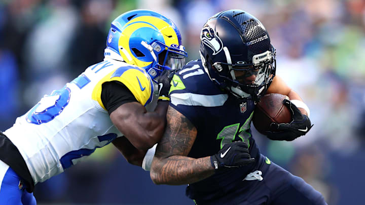 Jan 25, 2026; Seattle, WA, USA; Seattle Seahawks wide receiver Jaxon Smith-Njigba (11) runs against Los Angeles Rams cornerback Roger McCreary (25) during the first half in the 2026 NFC Championship Game at Lumen Field. Mandatory Credit: Kevin Ng-Imagn Images