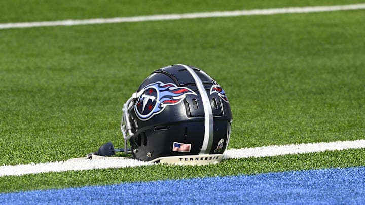 Nov 10, 2024; Inglewood, California, USA; A Tennessee Titans helmet on the turf during pregame warmups before an NFL game against the Los Angeles Chargers at SoFi Stadium. Mandatory Credit: Robert Hanashiro-Imagn Images