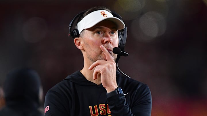 Nov 7, 2025; Los Angeles, California, USA; Southern California Trojans head coach Lincoln Riley watches game action against the Northwestern Wildcats during the second half at the Los Angeles Memorial Coliseum. Mandatory Credit: Gary A. Vasquez-Imagn Images