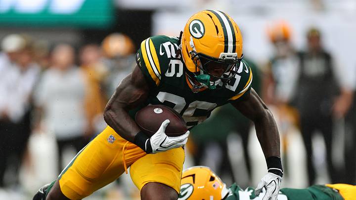 Sep 20, 2026; East Rutherford, New Jersey, USA;  New York Jets safety Dane Belton (6) makes a tackle on Green Bay Packers running back Kaleb Johnson (26) during the second quarter at MetLife Stadium.  Mandatory Credit: Vincent Carchietta-Imagn Images