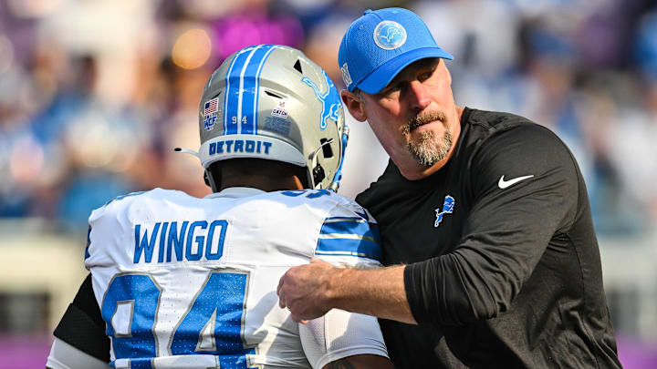 Detroit Lions head coach Dan Campbell greets defensive tackle Mekhi Wingo (94) before the game Detroit Lions head coach Dan Campbell greets defensive tackle Mekhi Wingo (94) before the game