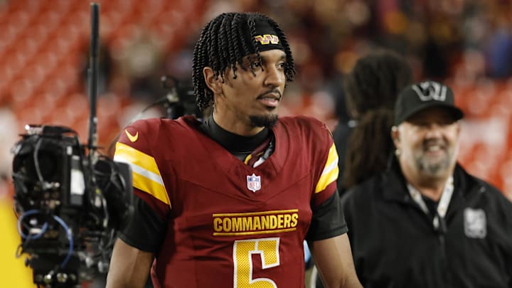 Dec 29, 2024; Landover, Maryland, USA; Washington Commanders quarterback Jayden Daniels (5) looks on while leaving the field after defeating the Atlanta Falcons at Northwest Stadium. Mandatory Credit: Amber Searls-Imagn Images Dec 29, 2024; Landover, Maryland, USA; Washington Commanders quarterback Jayden Daniels (5) looks on while leaving the field after defeating the Atlanta Falcons at Northwest Stadium. Mandatory Credit: Amber Searls-Imagn Images