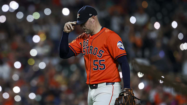 Sep 20, 2024; Houston, Texas, USA; Houston Astros relief pitcher Ryan Pressly (55) walks to the mound during the eighth inning against the Los Angeles Angels at Minute Maid Park.