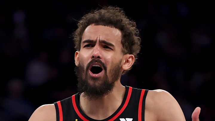 Trae Young appears upset in a game against the Knicks