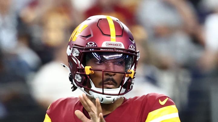 Washington Commanders quarterback Jayden Daniels passes the ball against the Dallas Cowboys. Washington Commanders quarterback Jayden Daniels passes the ball against the Dallas Cowboys.