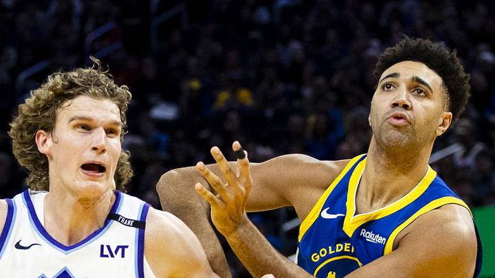 Jan 3, 2026; San Francisco, California, USA;  Utah Jazz forward Lauri Markkanen (23) drives past Golden State Warriors forward Trayce Jackson-Davis (32) during the third quarter at Chase Center. Mandatory Credit: John Hefti-Imagn Images