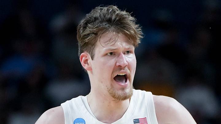Mar 19, 2026; Greenville, SC, USA; North Carolina Tar Heels center Henri Veesaar (13) celebrates after a play against the VCU Rams in the first half of a first round game of the men's 2026 NCAA Tournament at Bon Secours Wellness Arena. Mandatory Credit: Bob Donnan-Imagn Images