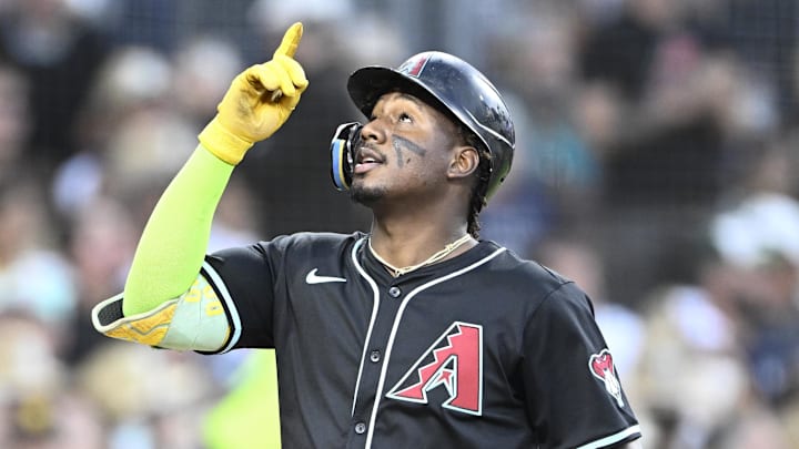 Jul 9, 2025; San Diego, California, USA; Arizona Diamondbacks shortstop Geraldo Perdomo (2) points skyward after hitting a grand slam during the fifth inning against the San Diego Padres at Petco Park. Mandatory Credit: Denis Poroy-Imagn Images