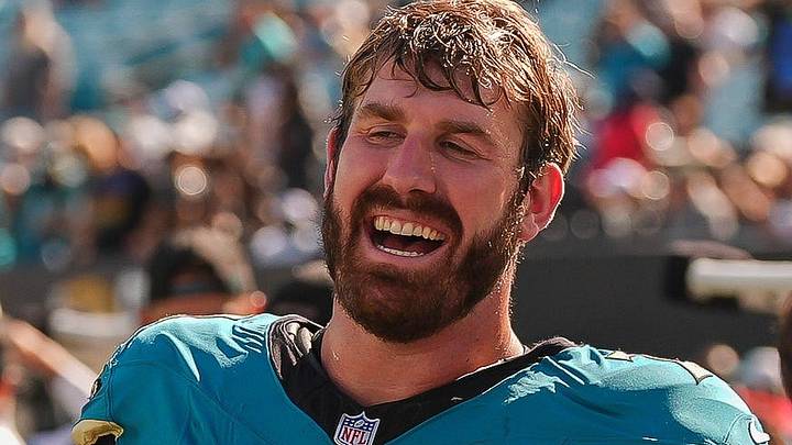 Jacksonville Jaguars offensive tackle Cole van Lanen (70) and Jacksonville Jaguars offensive tackle Walker Little (72) celebrate their win over the Patriots during an NFL football game at EverBank Stadium, Sunday, September 27, 2026, in Jacksonville, Fla. [Doug Engle/Florida Times-Union]