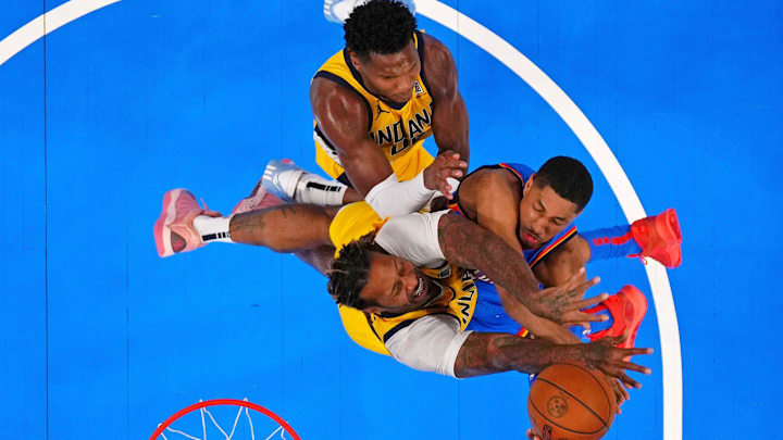 Jun 8, 2025; Oklahoma City, Oklahoma, USA; Oklahoma City Thunder guard Aaron Wiggins (21) shoots the ball against Indiana Pacers forward James Johnson (16) during the second half during game two of the 2025 NBA Finals at Paycom Center. Mandatory Credit: Kyle Terada-Imagn Images