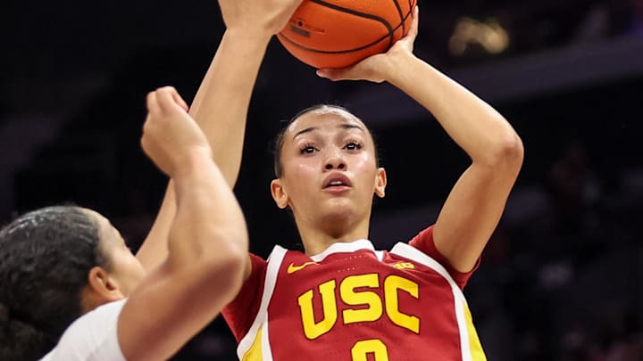 Nov 9, 2025; Charlotte, North Carolina, USA; Southern California Trojans guard Jazzy Davidson (9) shoots a basket against the NC State Wolfpack during the third quarter of the Ally Tipoff game at Spectrum Center. Mandatory Credit: Cory Knowlton-Imagn Images