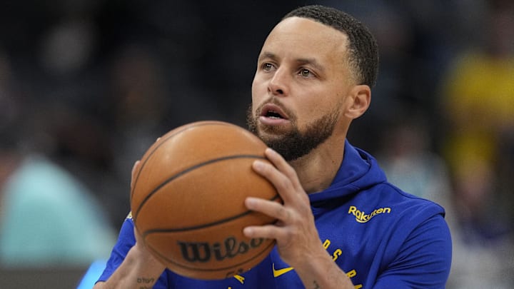 Golden State Warriors guard Stephen Curry warms up for a game.
