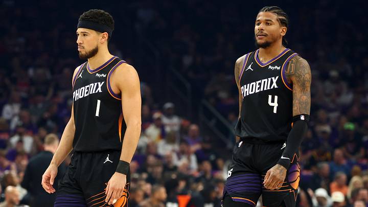 Apr 14, 2026; Phoenix, Arizona, USA; Phoenix Suns guard Devin Booker (1) and Jalen Green (4) against the Portland Trail Blazers during the play-in rounds of the 2026 NBA Playoffs at Mortgage Matchup Center. Mandatory Credit: Mark J. Rebilas-Imagn Images
