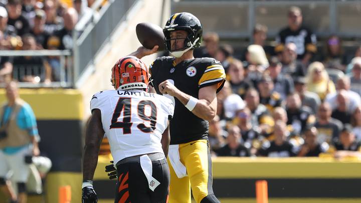 Sep 27, 2026; Pittsburgh, Pennsylvania, USA;  Pittsburgh Steelers quarterback Aaron Rodgers (8) throws against Cincinnati Bengals linebacker Barrett Carter (49) during the first quarter at Acrisure Stadium.  Mandatory Credit: Charles LeClaire-Imagn Images