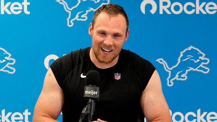 Detroit Lions linebacker Jack Campbell laughs and talks with the media during contract extension press conference