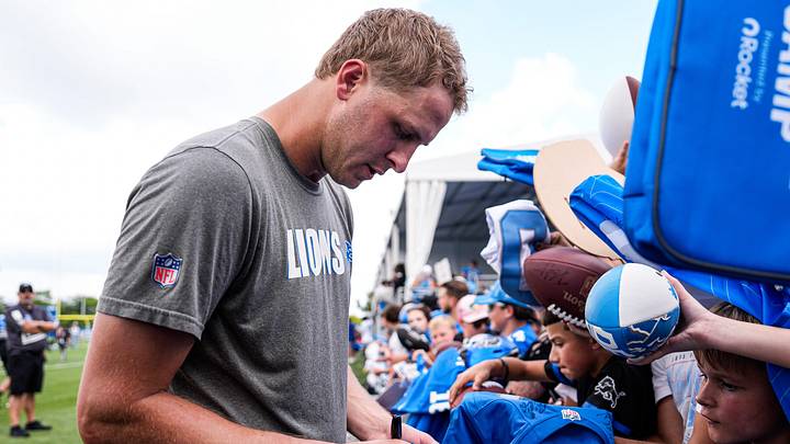 Detroit Lions quarterback Jared Goff signs autographs for fans during training camp Detroit Lions quarterback Jared Goff signs autographs for fans during training camp