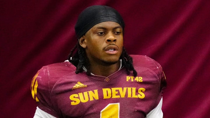 Arizona State running backs Kyson Brown (1) and Raleek Brown (3) take a water break during a practice inside the Verde Dickey Dome in Tempe on August 12, 2025.