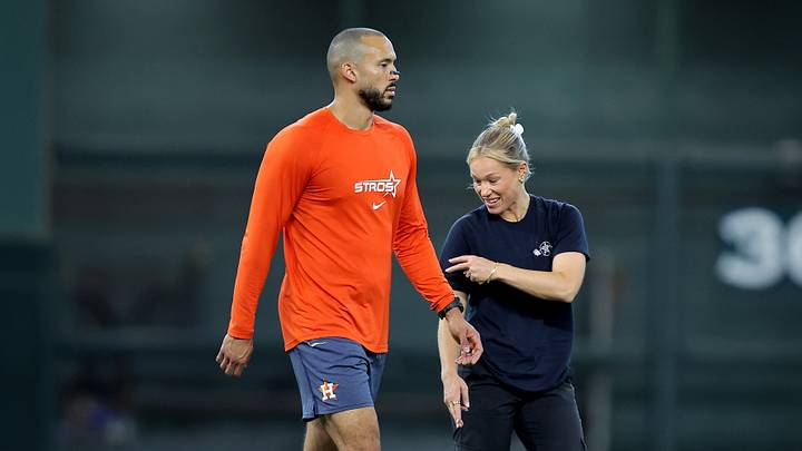 Aug 15, 2026; Houston, Texas, USA; Houston Astros shortstop Carlos Correa (1) with a team trainer prior to the game against the Seattle Mariners at Daikin Park. Mandatory Credit: Erik Williams-Imagn Images