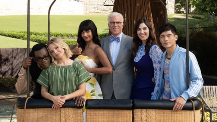 THE GOOD PLACE -- "Patty" Episode 412 -- Pictured: (l-r) William Jackson Harper as Chidi, Kristin Bell as Eleanor, Jameela Jamil as Tahani, Ted Danson as Michael, D'Arcy Carden as Janet, Manny Jacinto as Jason -- (Photo by: Colleen Hayes/NBC)