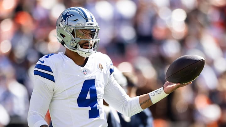 Dallas Cowboys quarterback Dak Prescott warms up for a game.