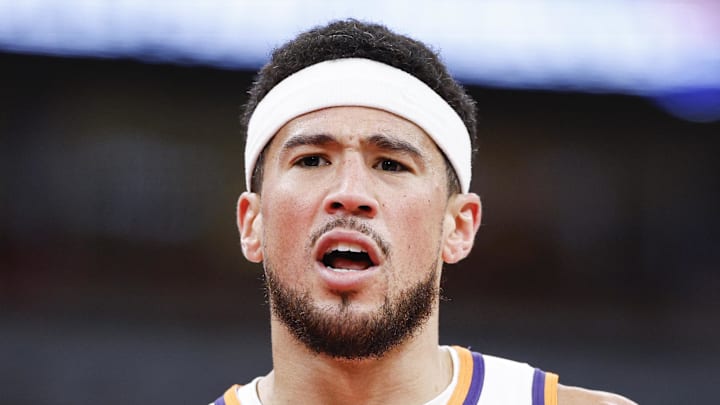 Apr 5, 2026; Chicago, Illinois, USA; Phoenix Suns guard Devin Booker (1) reacts during the second half at United Center. Mandatory Credit: Kamil Krzaczynski-Imagn Images