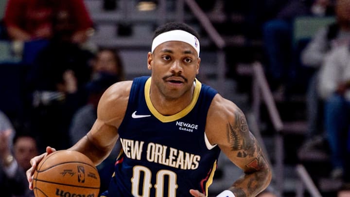 Mar 6, 2025; New Orleans, Louisiana, USA;  New Orleans Pelicans forward Bruce Brown (00) brings the ball up court against the Houston Rockets during the first half at Smoothie King Center. Mandatory Credit: Stephen Lew-Imagn Images