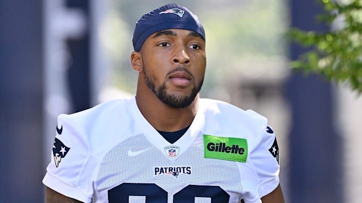 Jul 23, 2025; Foxborough, MA, USA; New England Patriots running back TreVeyon Henderson (32) walks to the practice field for training camp at Gillette Stadium. Mandatory Credit: Eric Canha-Imagn Images