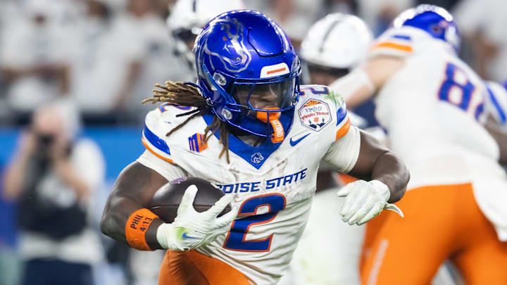 Dec 31, 2024; Glendale, AZ, USA; Boise State Broncos running back Ashton Jeanty (2) against the Penn State Nittany Lions during the Fiesta Bowl at State Farm Stadium. Mandatory Credit: Mark J. Rebilas-Imagn Images