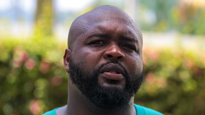 Jun 10, 2025; Miami, FL, USA; Miami Dolphins defensive tackle Benito Jones (95) speaks to reporters after practicing during mandatory minicamp at Hard Rock Stadium. Mandatory Credit: Sam Navarro-Imagn Images